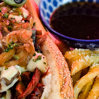 Romero's FRENCH DIP (served w/ truffle parm fries)