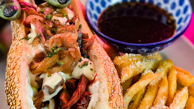Romero's FRENCH DIP (served w/ truffle parm fries).