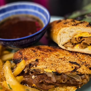 The FRENCH DIP (Served w/ fries)