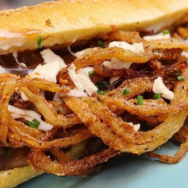 Indulge in Our Cheesesteak