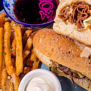 The FRENCH DIP (Served w/ truffle parm fries)